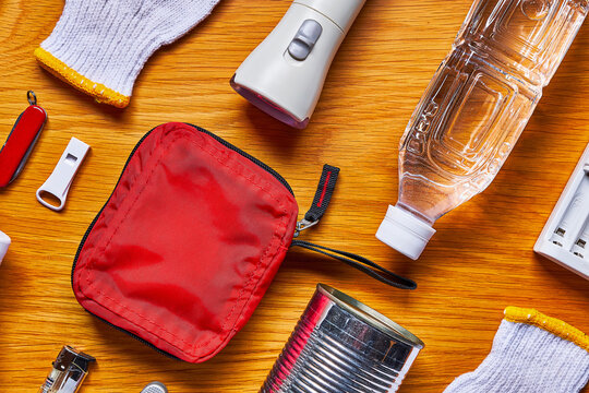 Disaster Preparedness Kit on Wooden Table