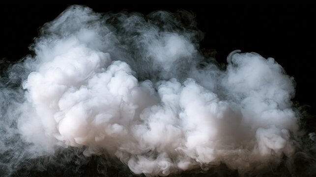 Dense white smoke cloud against dark background