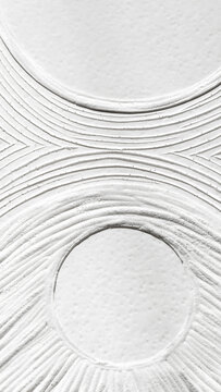 Flowing concentric ripples carved into a white monolithic canvas forming a large circular dome. Artistic handmade plaster rendering, elegant interior detail mockup, minimalist bright background.