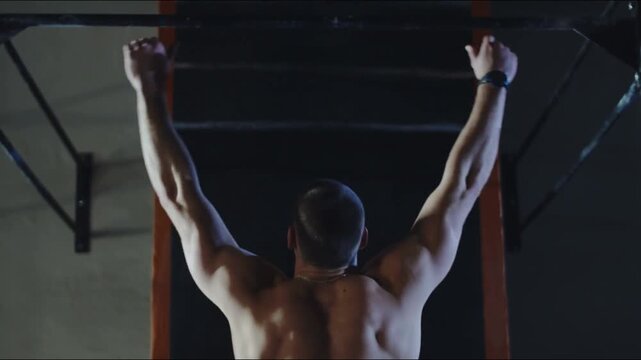 powerful young man muscular back, showcasing strength and dedication in gym club setting. Male Athlete Flexing Muscles in Modern Gym Environment. Motivate Exercise fitness Workout Sports weightlifting