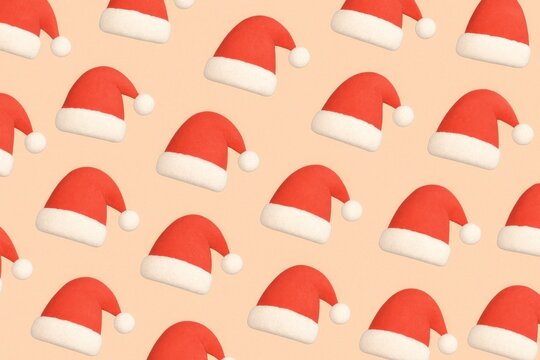 Festive Santa hats pattern wallpaper.