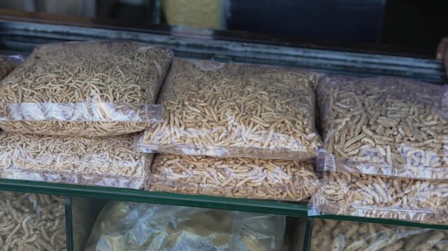 Assorted traditional Indian sev and namkeen packed in plastic