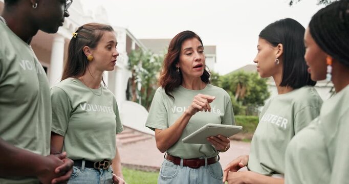 Community service, discussion and volunteer with tablet, outdoor and explain task assignment on web. Charity, team and happy people with tech, social responsibility and conversation with NGO schedule
