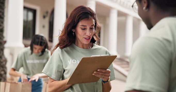 Volunteer, clipboard and happy woman with handshake for sign up, outdoor and task delegation. People, shaking hands and food parcel for community outreach, checklist and charity or nonprofit team