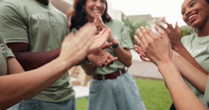 Volunteers, team and hands outdoor with clapping, support and motivation for donation campaign. Happy people, diversity or charity group with applause, encouragement or solidarity for welfare project