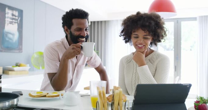 Black couple, tablet and laugh with breakfast in kitchen for social media, internet post or online. Happy people, tech and morning browse in home for funny joke, comedy or streaming service on app