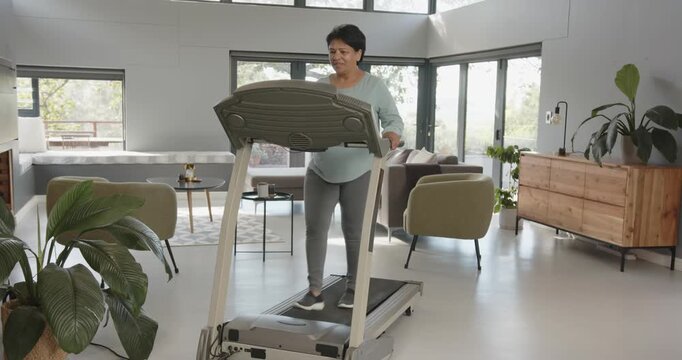 Lifestyle videos indoor of people doing activities at office, exercising on treadmill, woman walking