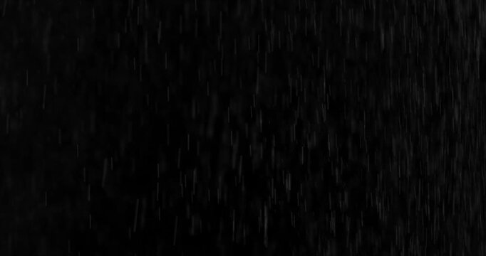 Realistic motion blurred rain streaks falling on a black background creating a natural weather VFX overlay ideal for compositing visual effects digital artwork atmospheric scenes and graphic design.