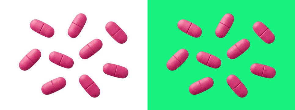 Pink medical pills and green backgrounds