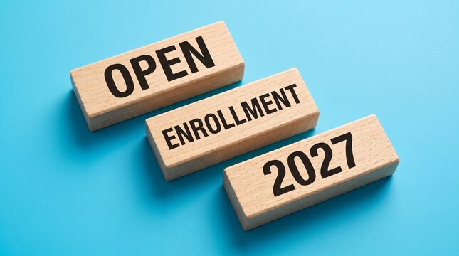 Wooden blocks with text open enrollment 2027 on a blue background