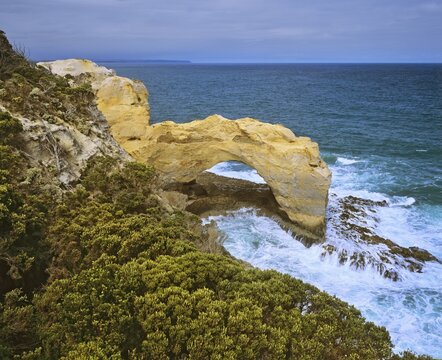 The rock arch The Arch, coast at the Great Ocean Road, Port Campbell, Victoria, Australia called
