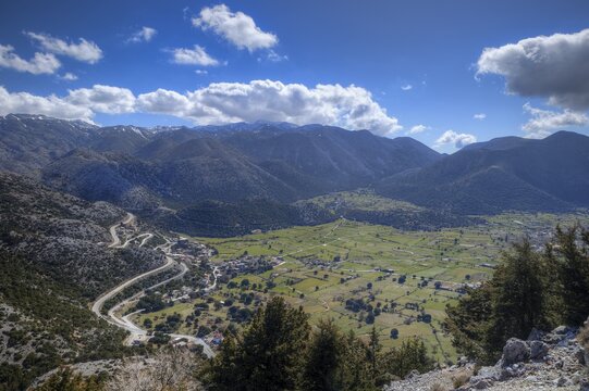 Panoramic view of meadows and roads running through a mountainous valley, Askifou Plateau, Askifou, Sfakia, West Crete, Crete, Greece
