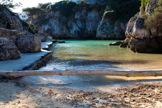 Binibeca cove with turquoise mediterranean sea water