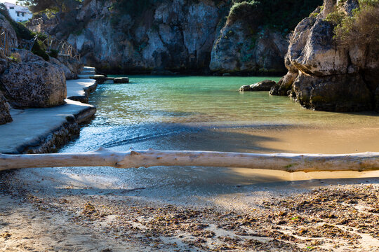 Binibeca cove with turquoise mediterranean sea water