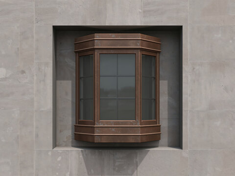 A brown bay window with a grid pattern set into a light gray stone wall with a recessed architectural frame and soft natural shadows on the surface