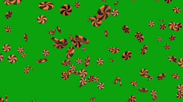 Spiral Orange Striped Candy Swirls for Halloween Delights Isolated: A colorful assortment of Halloween candy swirls. Falling Halloween lollipops, spiral trick-or-treat candies on chroma key