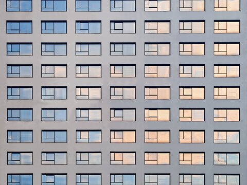Window frame pattern lighting reflection Modern building exterior Architecture details