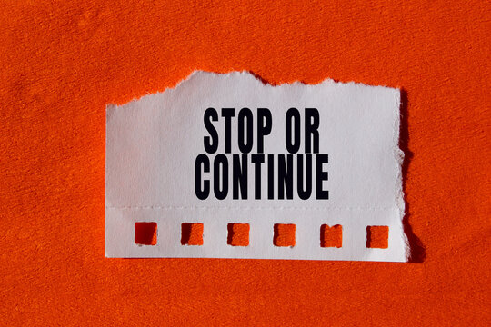 Stop or Continue text concept photo