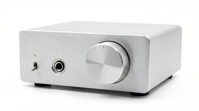 Compact silver desktop headphone amplifier on white background