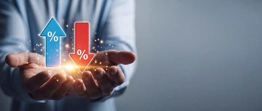 Conceptual Business Image of a Person Holding Glowing Blue Up and Red Down Arrows with Percent Symbols Representing Interest Rate Fluctuations, Financial Market Volatility, and Global Economy