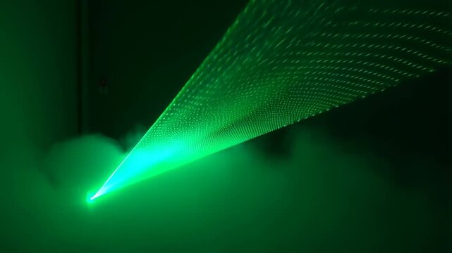 Green laser beam splitting through a diffraction grating in dark fog