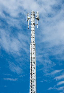 Telecommunication tower with antenna. Antenna array of telecommunication cell tower. 5G antenna transmitter. High speed mobile internet. Cellular network tower. Connectivity and communication