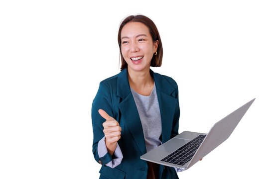Asian businesswoman giving thumbs up gesture and smiling, holding laptop, expressing approval, success and happiness