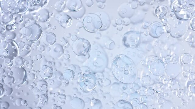 Super Slow Motion Shot of Oil Bubbles Floating in Water at 1000fps.