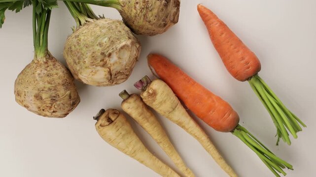 hand put fresh vegetables on ligt surface top view food