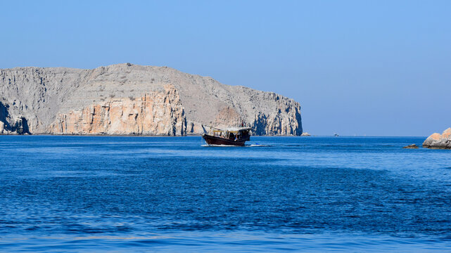 Single Dhow Boat Entering Fjords of Musandam, Oman