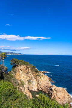 Beautiful view of Mediterranean Balearic sea from the viewpoint Mirado de Pu in the Marimurtra botanic garden of Blanes at Brava coast on sunny summer day, Selva, Girona Catalonia, Spain
