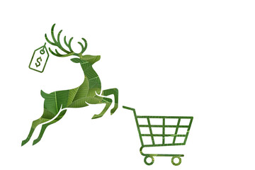 Green leaf reindeer pulling eco shopping cart for Christmas promotion © amornme