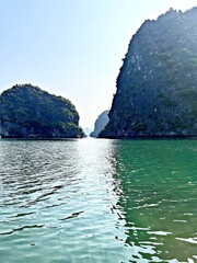 Towering limestone karsts emerge from emerald waters © Novanture
