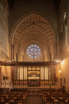 Architectural interior of the historic Crimea Memorial Church with neogothic arches and rose stained glass window in Istanbul.