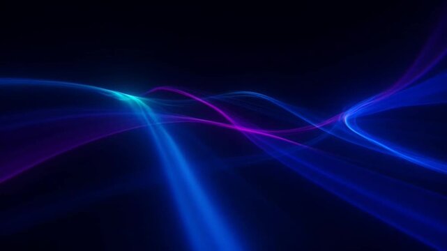 Abstract Blue and Purple Light Trails: Dynamic streaks of glowing blue and purple light curve and flow against a deep dark background, creating an abstract and futuristic visual effect.