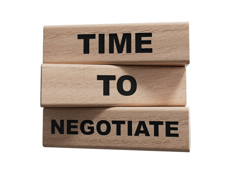 wood cubes and a wooden block with the text Time to negotiate. wood cubes. Copy space.Supports PNG files with transparent backgrounds.