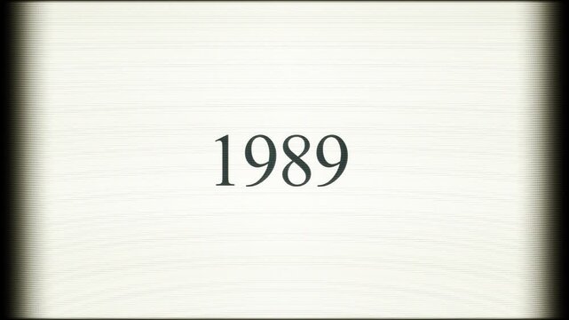 The year 1989 appearing on a vintage CRT screen. A pixelated text cursor types out the numbers, creating a retro computing aesthetic.