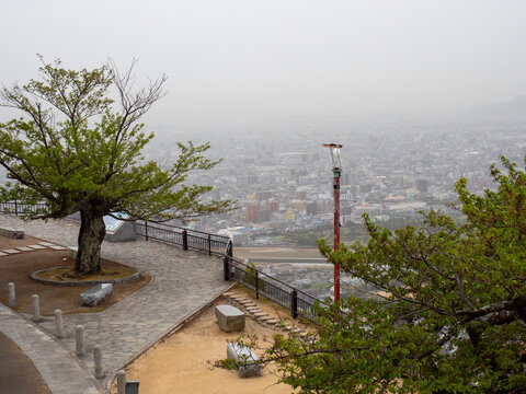 Shishi no Reigan observatory on Yashima with panoramic view of Takamatsu city in the morning mist - Kagawa prefecture, Japan