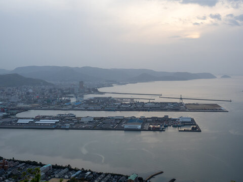 View of Takamatsu city and Seto Inland Sea at dusk from Shishi no Reigan observatory on Yashima - Kagawa prefecture, Japan