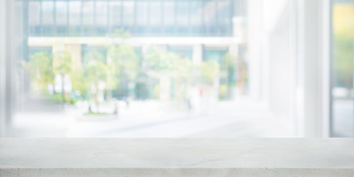 Selective focus.White luxury marble countertop with blue cityscape