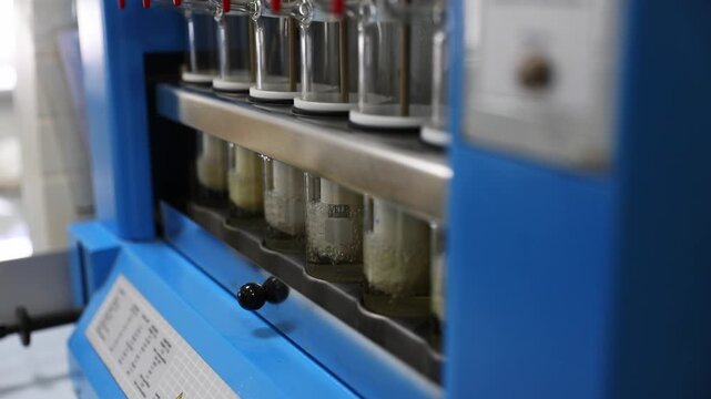 Close-Up of Laboratory Distillation Apparatus with Glass Test Tubes for Chemical Analysis