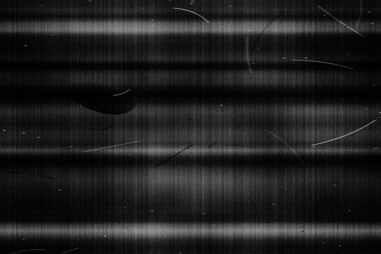Vintage VHS glitch texture with analog film grain, retro television screen distortion, dark cinematic overlay with dust and scratches