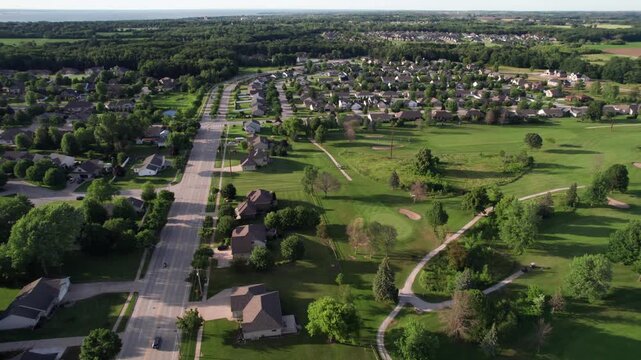 Right to Left Golf Course shot and neighborhood by drone.