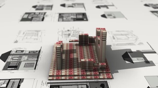 Chinese Yuan banknotes construct a house on blueprints, representing property investment