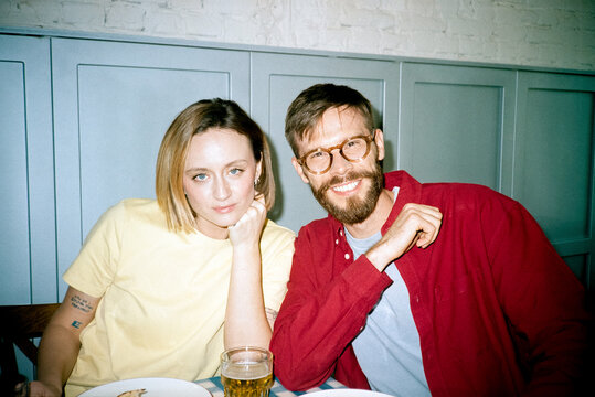Couple posing in restaurant