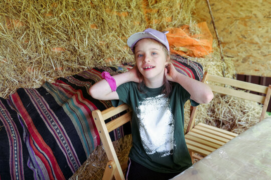 Outdoor activity with a child with Down syndrome at a camp