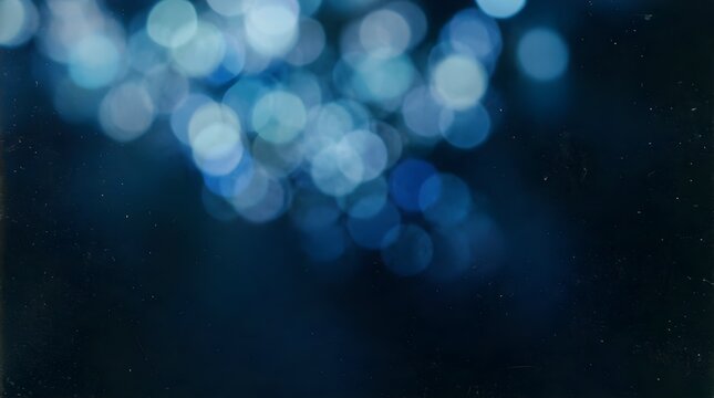 Soft Blue Bokeh Lights Fade Out on Dark Background