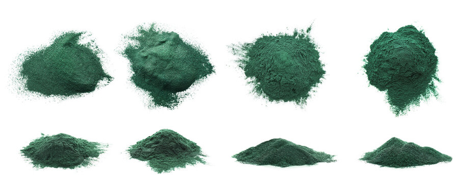 Spirulina powder in heaps isolated on white, set. Top and side view