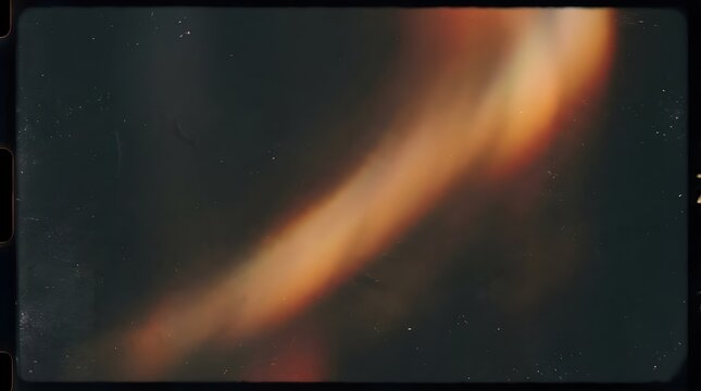 Warm Light Leak Effect with Film Grain and Dust Overlay