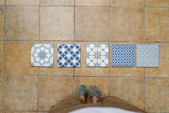 POV of patterned tile samples for home renovation